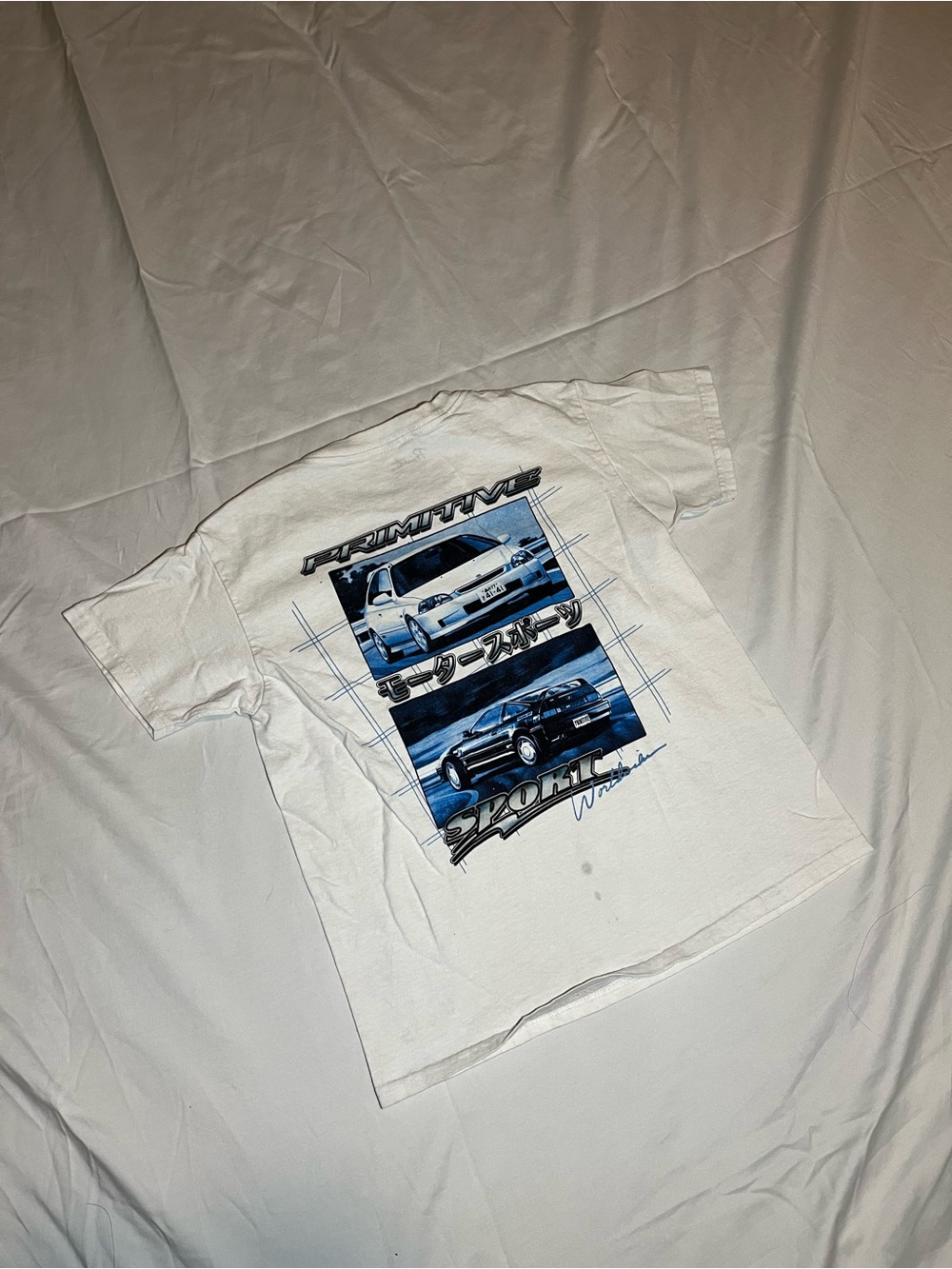 Primitive White Short Sleeve Tee with Blue Car Graphics